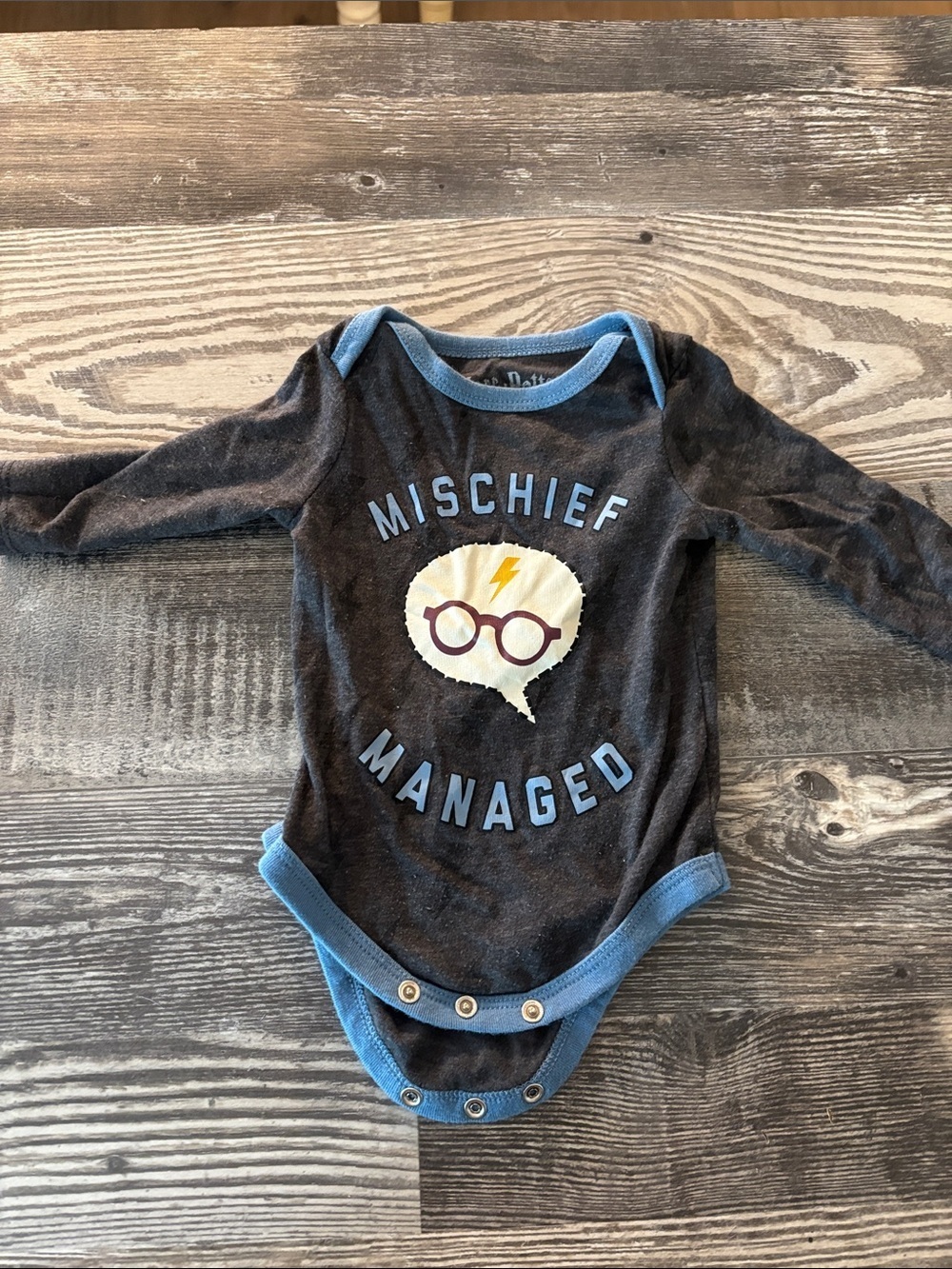 Harry Potter Mischief Managed Long-Sleeve One-Piece in Dark Gray with Blue Trim